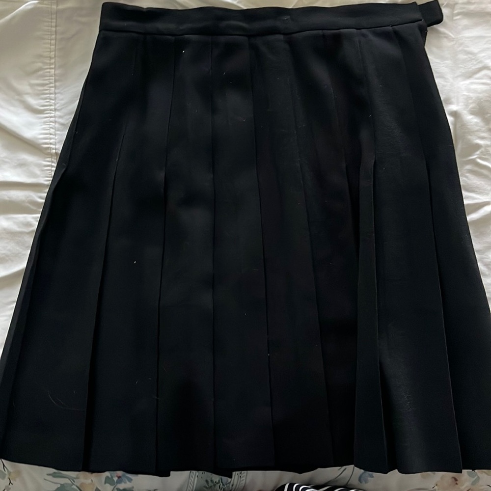 WHEATON&KATZLTD-LIMITED EDITION- black pleated knee length skirt -gently used